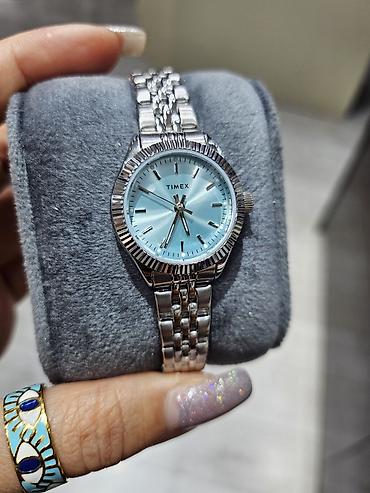 irsad saat: Timex qadın qol saatı - Korpus və qolbaq: paslanmayan polad, parlaq — 1
