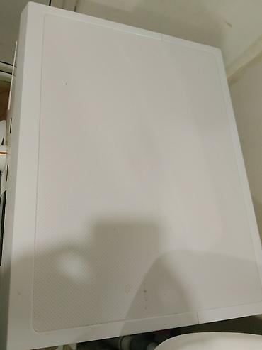 Бытовая техника: Стиральная машина Midea MFE60-S1008, фронтальная загрузка. Основные — 7