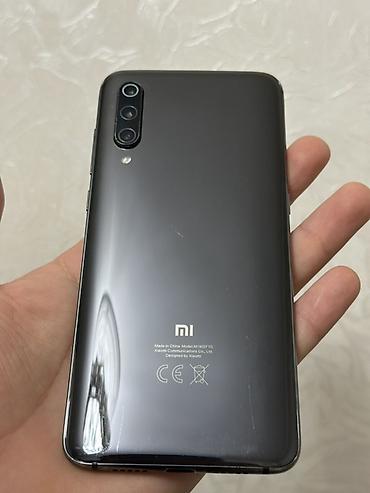 redmi 7 note: Xiaomi Mi 9, 64 GB, rəng - Qara, 
 Sensor, Barmaq izi, Simsiz şarj — 3