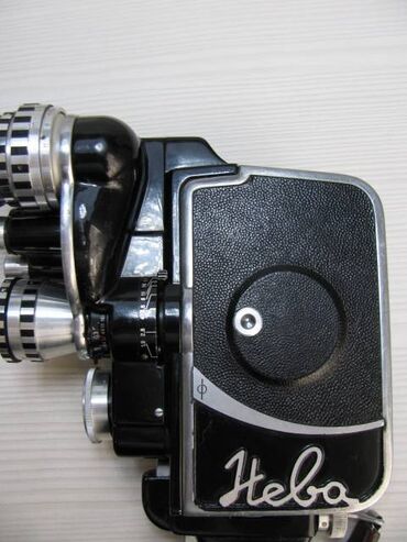 Видеокамеры: Продаю советскую, рабочую, красивую, винтажную кинокамеру "Нева" 1963 — 2