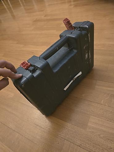 islemis acarlar: Qara rəngli plastik alət çantası. Bocsh perforatorun futlyarıdır — 3