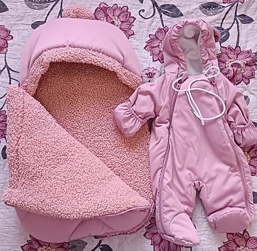 Продаю абсолютно новый и очень теплый конверт+комбинезон от Dana Baby