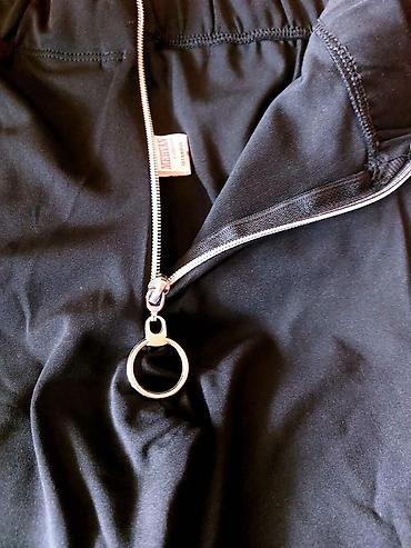 Pantalone: Likra zvonarice sa zipom, dubok struk. - Model: crne pantalone — 3