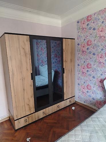 Dolab satılır. - Model: 4 qapılı geyim dolabı - Material və dizayn