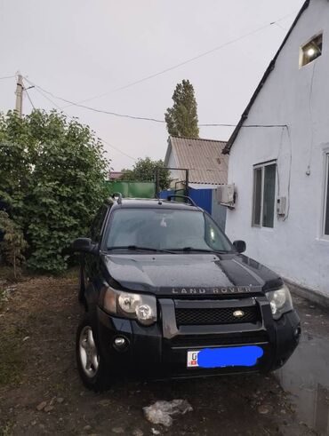 рэндж ровер: Land Rover Freelander в черном цвете. Этот внедорожник оснащен
