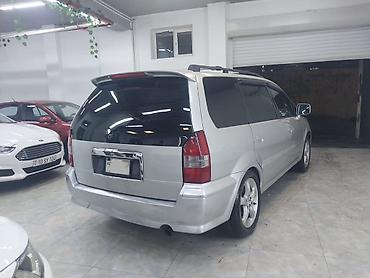 mitsubishi lancer evolution: Mitsubishi Chariot Grandis – 7 yerlik geniş ailə miniveni — 4