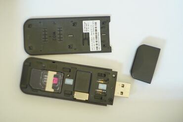 модем карманный: USB-модем для подключения к мобильному интернету. Поддерживает