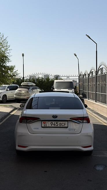 икс трейл: Toyota Corolla: 2022 г., 1.8 л, Вариатор, Гибрид, Седан — 7