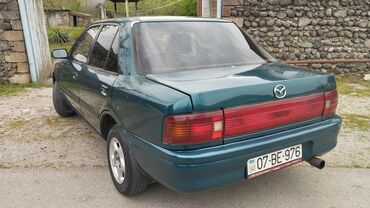 Mazda: Mazda 323: 1.6 l | 1994 il Sedan — 2