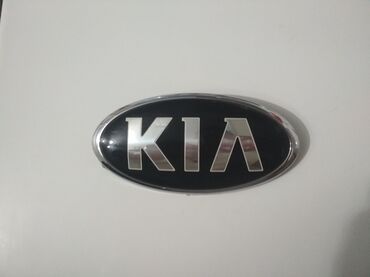 Аксессуарлар: Продаю KIA, Знак эмблема KIA в оригинале! Цена 500 сом!