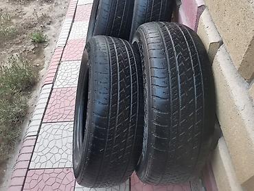 воздушный сидения: Комплект летних шин Bridgestone Dueler H/T - Количество: 4 штуки - — 4