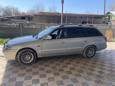 буфер колонки для авто: Mazda Capella: 2001 г., 2 л, Механика, Бензин, Универсал