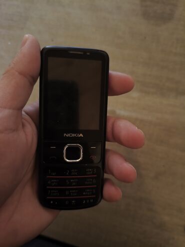 телефон fly iq4514 evo tech 4: Nokia 6700 Slide, 16 GB, rəng - Qara, Düyməli