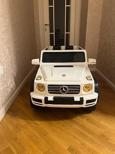 traktor satisi type 1: Uşaqlar üçün elektrikli minik maşını – ağ rəng, Mercedes G-Class — 1