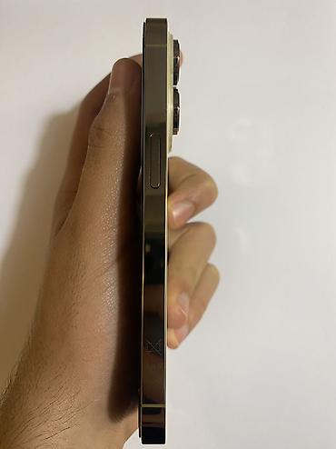 iphon 10: IPhone 14 Pro, 128 GB, Rose Gold, Face ID, Simsiz şarj — 4