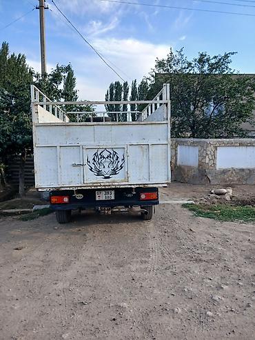 q 7: Грузовой фургон на базе микроавтобуса Ford Transit с высокими бортами — 2