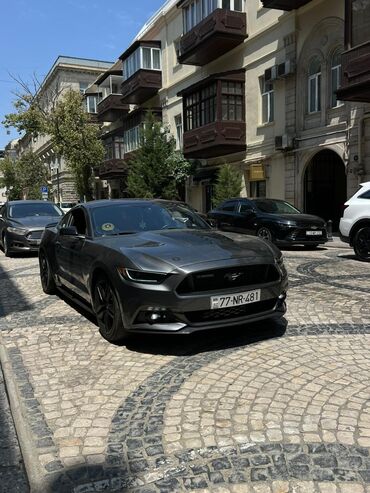 Ford: Model: Ford Mustang GT, kupe, 2 qapı Rəng: Tünd boz (metallic) Nömrə — 3