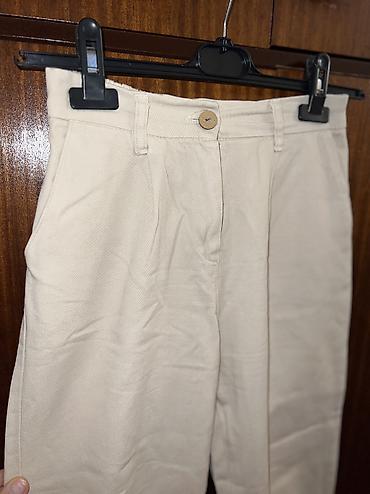 deri salvar: Bej rəngli qadın şalvar - Model: yüksək belli, daralan (tapered) — 3