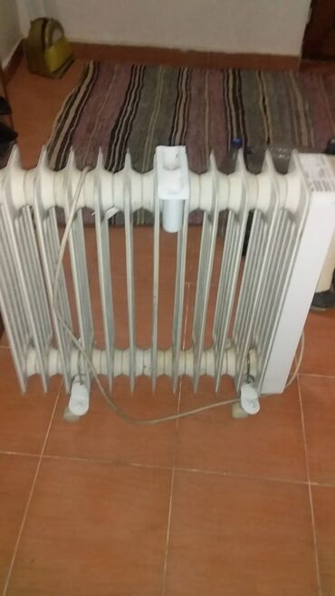 Qab-qacaq və mətbəx ləvazimatları: Məişət əşyaları dəsti 1) Elektrik yağ radiatoru - Şaquli seksiyalı