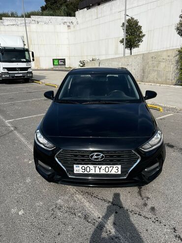 Hyundai Accent: 1.6 л | 2019 г. Седан