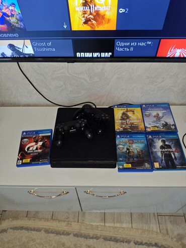 hard disk 1tb: Ps4 slim 1 tb satılır 370 manat 2 pult 20 oyun disk ilə toplam the