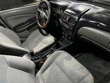 Унаа сатуу: Nissan Almera: 2002 г., 1.8 л, Кол менен иштөөчү, Бензин, Седан — 6