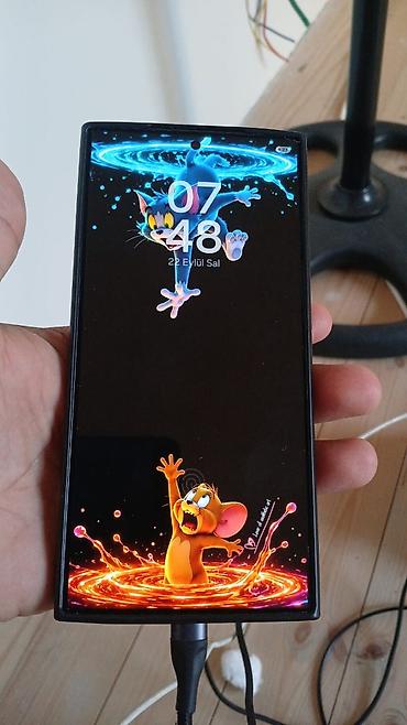 2 el telfonlar: Samsung Galaxy S24 Ultra, 256 GB, rəng - Boz, Barmaq izi — 2