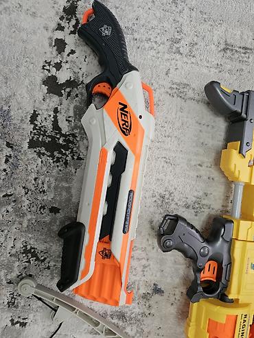 nerf бластер: Набор игрушечных бластеров и лука для стрельбы мягкими снарядами — 1
