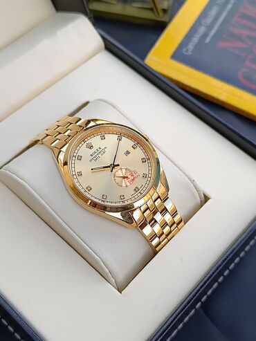 saatların qiyməti: *Kişi saatı* Yenidir.Petek Philippe,Rolex.firmalari Rəngi