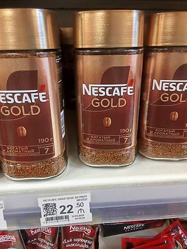 İçkilər: Məhsul: böyük bankada Nescafé Gold həll olunan qəhvə Brend: Nestlé — 1