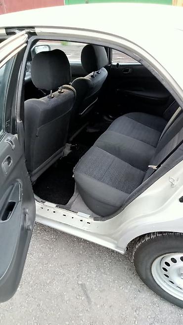 smart plus: Mazda 323: 1995 г., 1.5 л, Автомат, Бензин, Седан — 6
