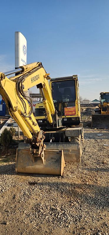Экскаваторы: Экскаватор, Hyundai, 2012 г., Колесный — 1