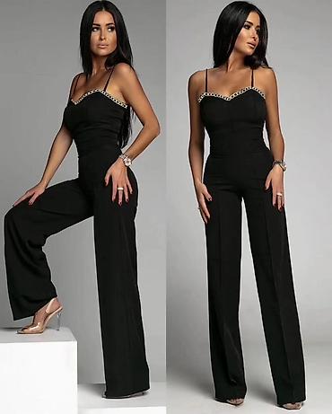 crni kombinezon zenski: 💫Elegantni crni ženski kombinezon
✅2800 din — 1