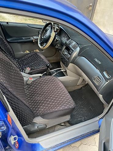 мазда фк: Mazda 323: 2003 г., 1.3 л, Механика, Бензин, Хэтчбэк — 3