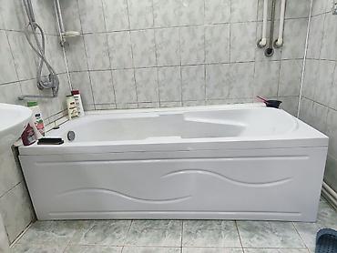 Akril hamam vannası – yan panelli, müasir dalğalı dizayn. - Material