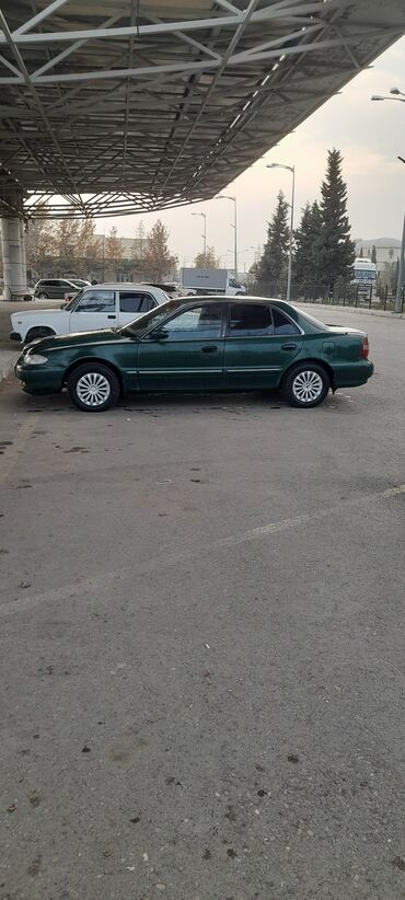 Hyundai: Hyundai Sonata: 2 l | 1997 il Sedan — 6