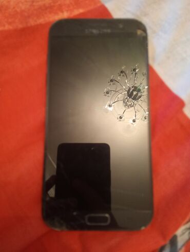 Samsung: Biri 10 AZN — 12