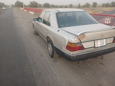 купить запчасти на опель вектра б: Седан Mercedes-Benz E-класса (W124) серебристого цвета с характерным