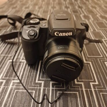 canon eos 7d: Canon PowerShot SX70 HS 4K WiFi 1200 manata alınıb,az istifade olunub