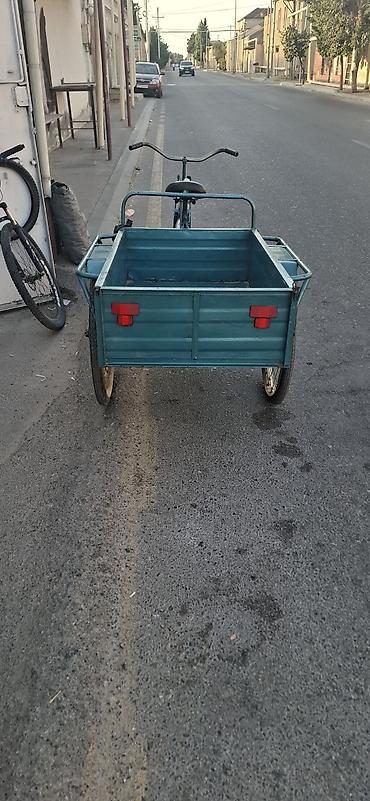 veıosiped: Yükdaşıma üçtəkərli velosiped yaxsi vezziyetdir unvan Merdekan — 2