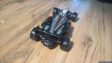 Igračke: 1. Formula 1 nema daljinski Crno Siva 44 x 18 cm 2. Formula crvena — 4