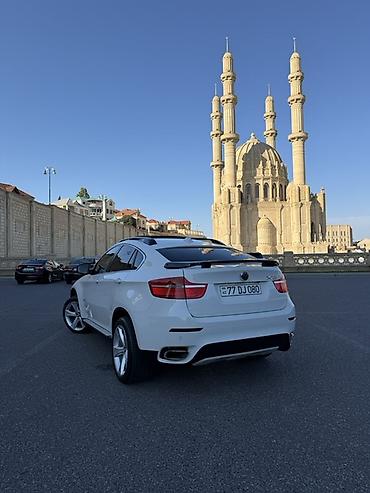 BMW: BMW X6 – ağ rəngli, kupe-siluetli premium krossover. Güclü və dinamik — 1