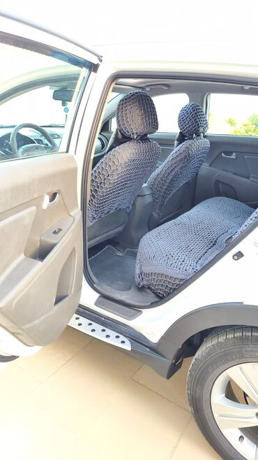 Kia: Kia Sportage: 2.4 l | 2011 il Sedan — 18