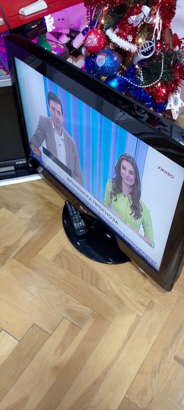 Televizori: TV lcd LG 32 inča ili 82 dijagonala ekrana sa daljinskim upravljačem — 2