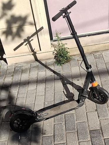 scooter şarjlı: Elektrik skuter - Şəhər içi qısa məsafələr üçün kompakt elektrik — 1