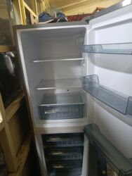 муздаткычтар буу: Холодильник Keg. Новый, двухкамерный. есть небольшая вмятина но на