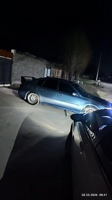кия к5 хищник: Subaru Legacy: 2003 г., Седан — 10