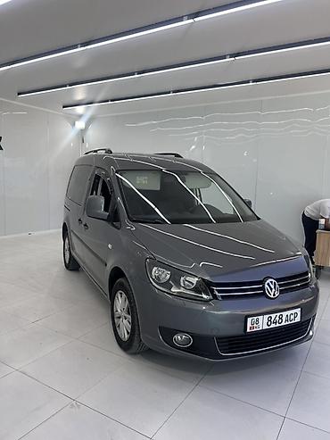 места: Volkswagen Caddy: 2013 г., 1.2 л, Механика, Бензин, Универсал — 3