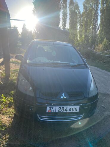 машына ош: Mitsubishi Colt – это универсальный автомобиль, сочетающий в себе