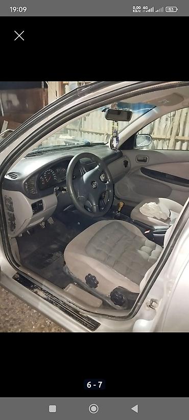 суппорт марк 2: Nissan Almera: 2001 г., 1.8 л, Механика, Бензин, Хэтчбэк — 5